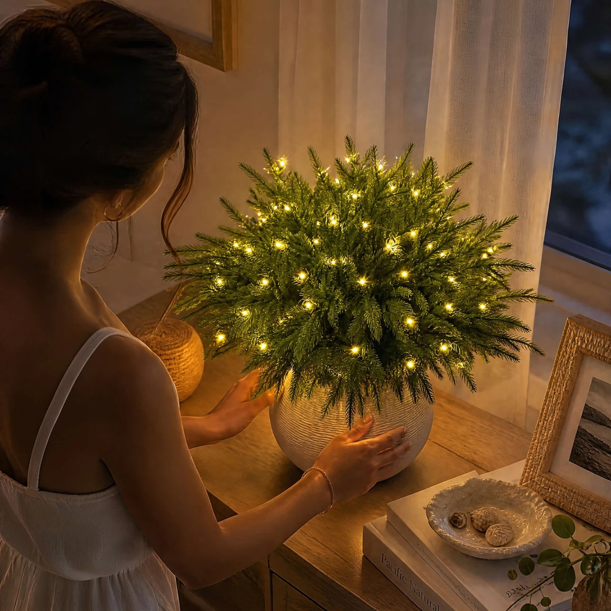 Turn on warm glowing evergreen pine lights